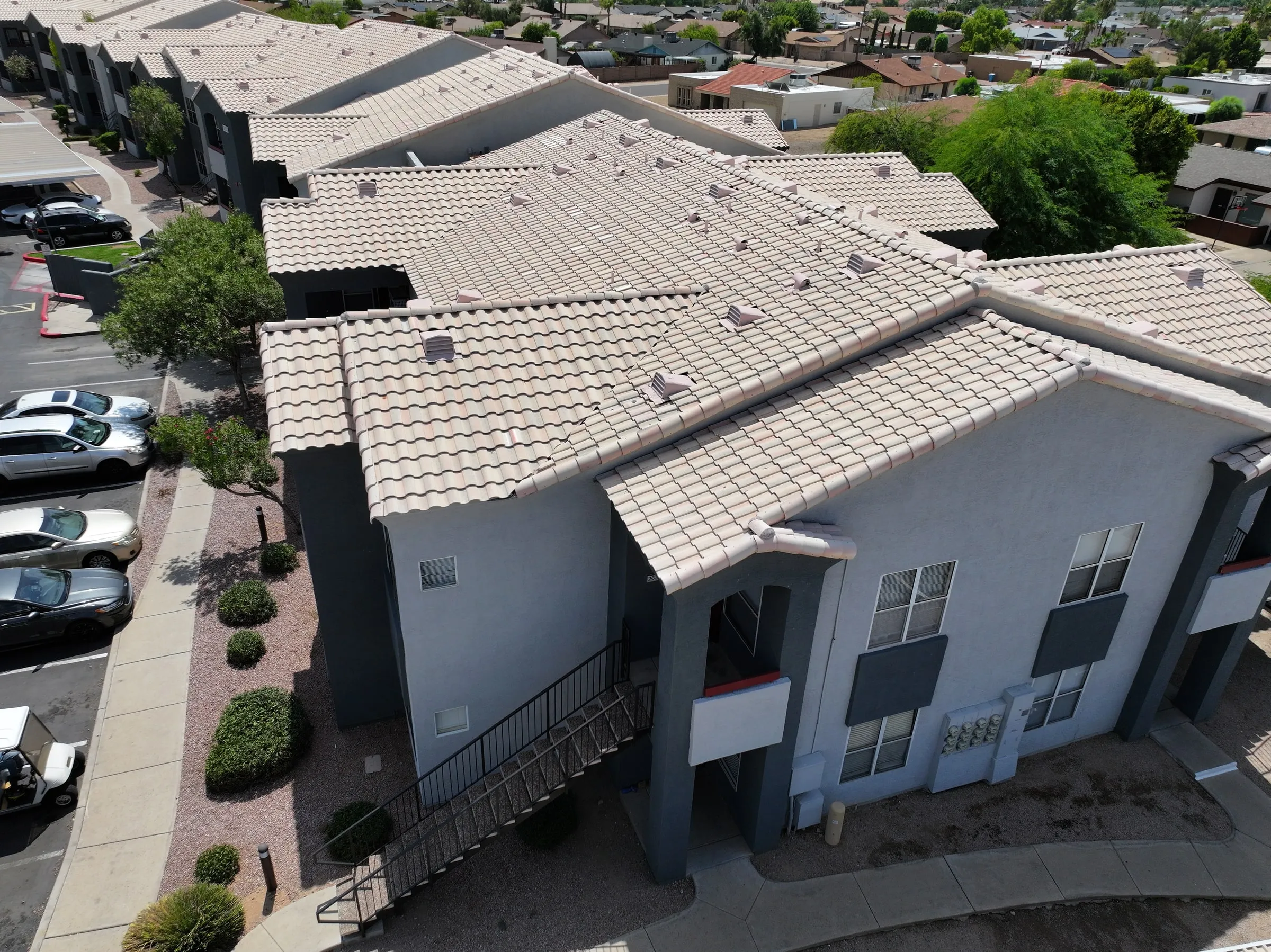 Completed tile roofing across a multifamily property